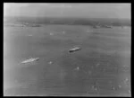 Royal Yacht Britannia with destroyer escort, Bay of Islands