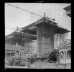Construction of southern motorway viaduct, Newmarket, Auckland, including house used as site office