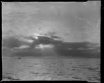 Sunset with fishing boat on Hauraki Gulf, Auckland Region