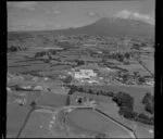 Midhirst, Taranaki Region, featuring dairy factory and including Mount Taranaki in the background