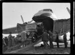 Bristol Freighter tour, Christchurch, loading a car into the aircraft during the Canterbury Aero Club field day