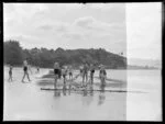 Examining the nets at Arkles Bay, Whangaparaoa Peninsula