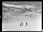 Skiers on Coronet Peak