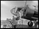 Unloading freight from aircraft, Harewood Airport, Christchurch