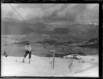 Skiers using Coronet Peak rope tow
