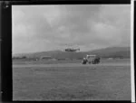 New Zealand National Airways Corporation, Lodestar aircraft flying over new airstrip at Paraparaumu Airport