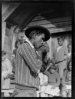 Thomas Biddle of Korohe playing the harmonica