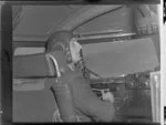 Royal New Zealand Air Force Squadron Leader Hazelden in cockpit of Handley Page Hastings airplane