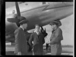 From left, Squadron Leader AH Harding, IK Bennett and Wing Commander T de Lange, alongside Handley Page Hastings airplane, location unidentified