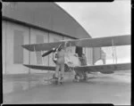 Airwork New Zealand Ltd, preparing to start Moth aircraft engine