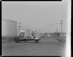 Shell Oil NZ Ltd, oil storage tanks and the mobile crane, no 663, [Auckland?]