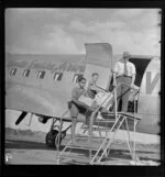 Qantas Empire Airways, Bird of Paradise Service, newspapers arriving by air, Rockhampton, Queensland, Australia