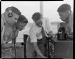 ATC [Air Training Corps] cadets at Whenuapai control tower, J H Bayliss, D Woolford, C M Simpson and control tower chief R Parker