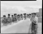 ATC [Air Training Corps] cadets at Whenuapai, receiving instruction about Harvard aircraft