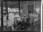 Unidentified group drinking tea on the verandah, Northern Hotels, Ba, Fiji