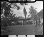 Three unidientified men standing outside [Northern Hotels?], Ba, Fiji