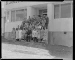 Staff of St James's Tobacco Company of New Zealand Ltd outside the building in Penrose, Auckland