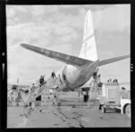 Passengers entering an NAC Viscount jet aeroplane