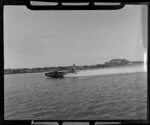 Tasman Empire Airways Ltd aircraft taking off, Mechanics Bay, Auckland