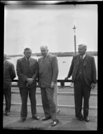 Tasman Empire Airways Limited Chairman Sir Leonard Isitt, British Overseas Airways Corporation Sir Miles Thomas, and airline employee Mr Barrow, at Auckland flying boat base