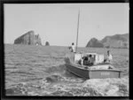 Four men on boat Ozone, which has a swordfish tied to the back, Bay of Islands, Far North District, Northland Region