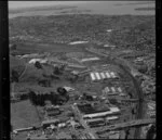 Factories at the base of Mt Wellington, Auckland, looking past Glen Innes and Glendowie to Waitemata Harbour