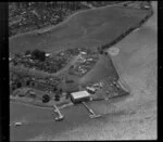 Building and jetty on the shores of the Tamaki River, Panmure, Auckland