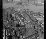 Unidentified factories in industrial area, Manukau City, Auckland, including tidal inlet and railway yards