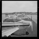 A row of Airtourer aeroplanes on the airstrip at Auckland Aero Club, Mangere