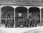 Winkelmann, Henry 1860-1931 :[Uniformed residents outside the Ranfurly Veterans' Home in Mount Roskill, Auckland]