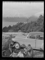Harry Wigley and Keith [?] having a picnic beside the Chevrolet at Lake Ohau, Waitaki County