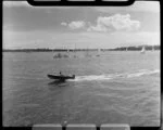 Auckland Anniversary Regatta, Auckland Harbour, showing sailing boats and small speed boat in foreground