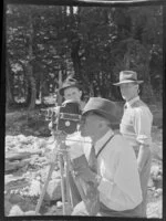 Henry Wigley probably with camera and two other unidentified men at Lake Ohau, Waitaki District, Canterbury Region