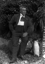 Jack Norton and a penguin, Campbell Island