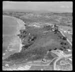 Stanmore Bay, Whangaparaoa Peninsula, Auckland Region, showing houses and beach