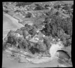 Red Beach, Rodney District, Auckland, showing houses and cliff face