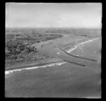 Wanganui River, view of harbour entrance with moles, Castlecliff housing estate with city beyond