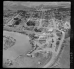 Helensville, Auckland, showing Mill Road and Commercial Road (part of State Highway 16), and dairy factory and Kaipara River