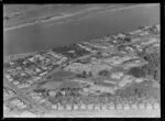 Close-up view over Wanganui Public Hospital, surrounded by residential housing with Tawa Street and Koromiko Road and Heads Road, and the Wanganui River beyond