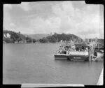 Passenger boat 'Kewpie' with another boat alongside pier, Otehei Bay, Urupukapuka Island, Bay of Islands, Northland