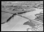 Showing Tamaki River estuary with bridge and Southern Motorway under construction looking south, Otahuhu, Auckland.