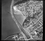 Parnell, Hobsons Bay, Auckland, view over Tamaki Drive Motorway with Mechanics Bay and wharf, Parnell Baths and Dove Meyer Robinson Park