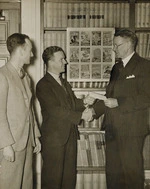 Robert Semple presenting prize to Leonard Cornwall Mitchell, while B A Marris looks on