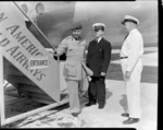 Pan American World Airways, unidentified man disembarking from a Stratocruiser aircraft at Whenuapai Airbase, Auckland