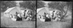 Campsite, featuring large group outside tents and including Union Jack flag, Poraiti