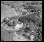 Red Beach, Rodney District, Auckland, showing houses and cliff face