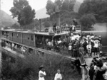 Paddle steamer Manuwai loaded with passengers, berthed on the Whanganui River