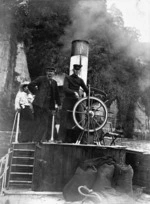 Captain Kenny Stuart and helmsman on Wanganui river steamer