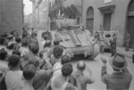 Kaye, George, b 1914: New Zealand tank being greeted by citizens of Florence