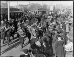 Parade of World War I soldiers through Cathedral Square, Christchurch, with army brass band